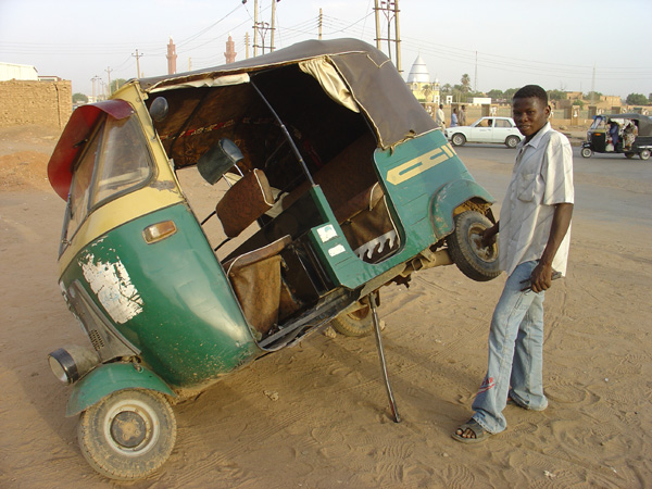 Omdurman street tuk tuk maintenance