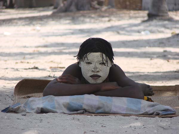 DSC06011 portrait white face Pangane fishing village by Peter Bennett