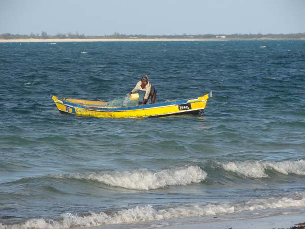 DSC06100 Pangane village shoreline boatman by Peter Bennett